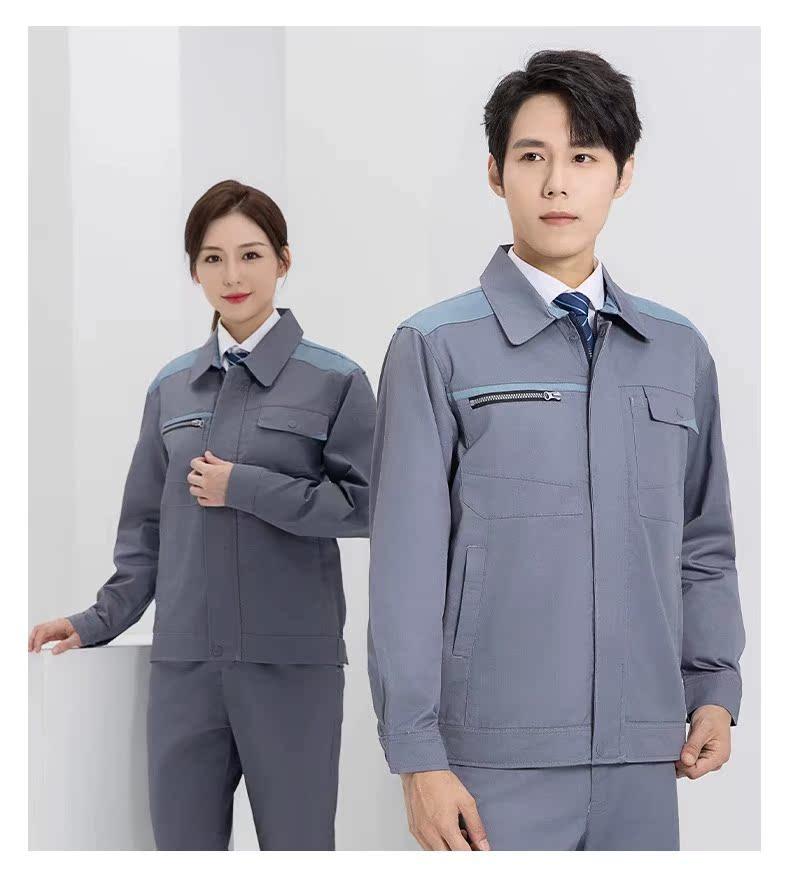 Man and woman wearing grey two-piece work suits with blue shoulder yokes