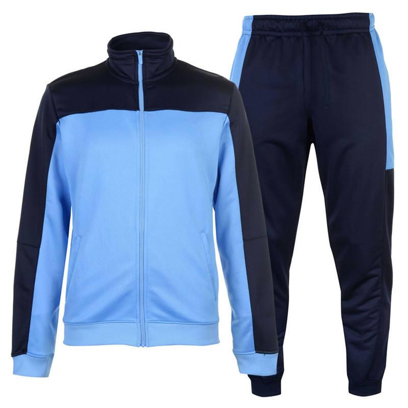 Light blue and navy two-piece tracksuit with colour-blocked panels